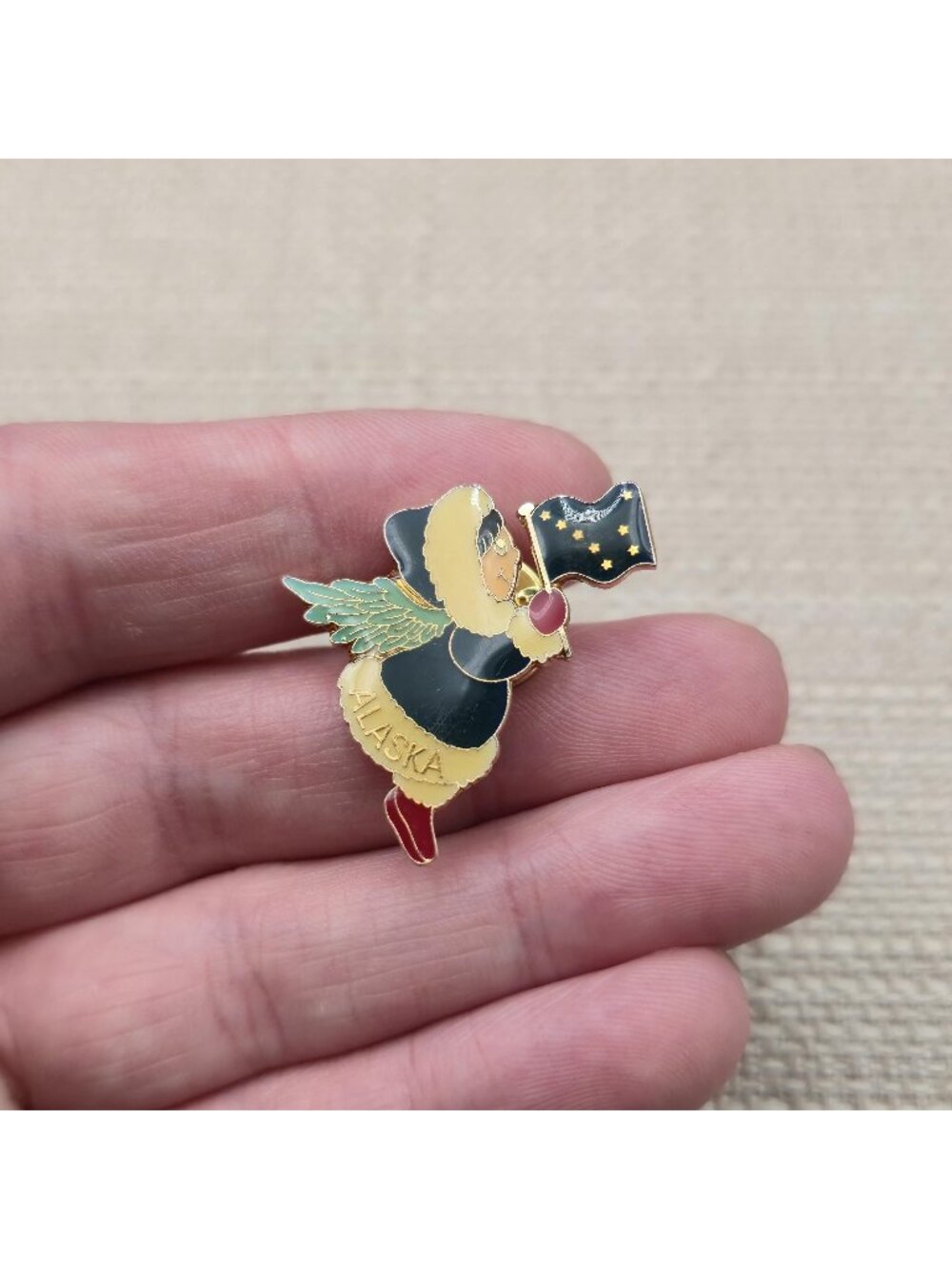 Vintage Alaska Inuit Eskimo Guardian Angel Holding State Flag Enamel Pin A8872